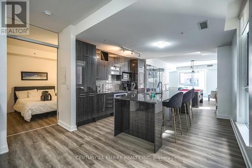 325 - 30 Nelson Street, Toronto (Waterfront Communities), ON - Indoor Photo Showing Kitchen With Upgraded Kitchen