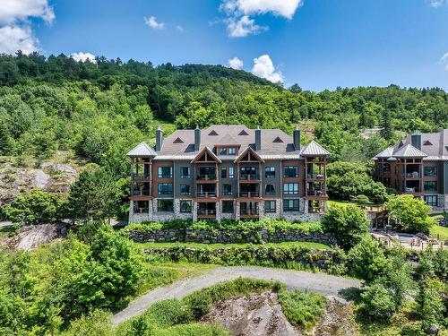 FaÃ§ade - 6-170 Ch. Des Sous-Bois, Mont-Tremblant, QC - Outdoor With Balcony