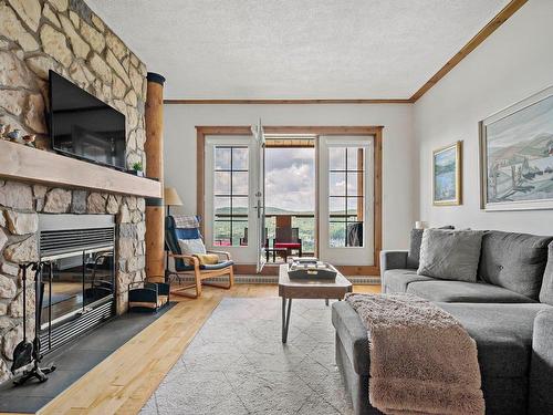 Salon - 6-170 Ch. Des Sous-Bois, Mont-Tremblant, QC - Indoor Photo Showing Living Room With Fireplace