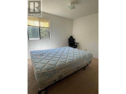 212 Spieker Avenue Unit# 205, Tumbler Ridge, BC - Indoor Photo Showing Bedroom