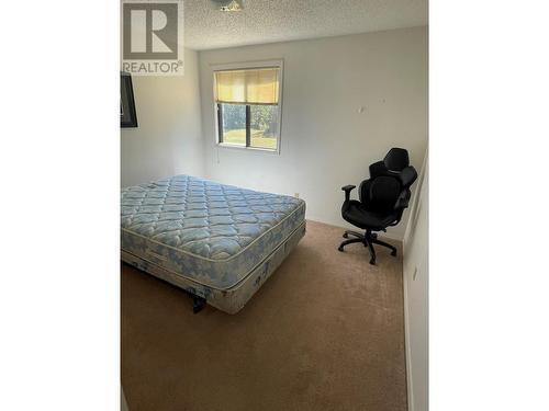 212 Spieker Avenue Unit# 205, Tumbler Ridge, BC - Indoor Photo Showing Bedroom