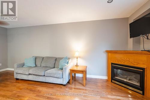 31 - 10 Cadham Boulevard, Hamilton (Broughton), ON - Indoor Photo Showing Living Room With Fireplace