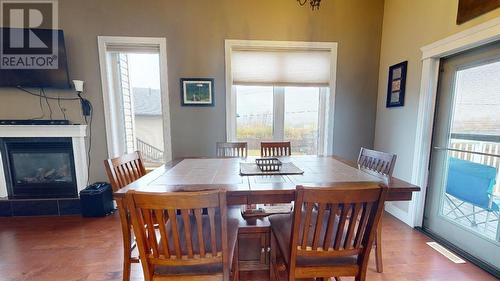 11727 88 Street, Fort St. John, BC - Indoor Photo Showing Dining Room With Fireplace