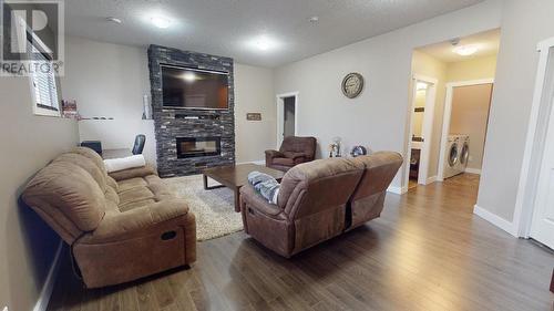 11727 88 Street, Fort St. John, BC - Indoor Photo Showing Living Room With Fireplace