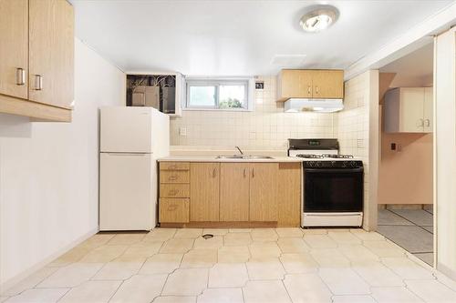 420 West 5Th Street, Hamilton, ON - Indoor Photo Showing Kitchen With Double Sink