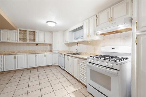 420 West 5Th Street, Hamilton, ON - Indoor Photo Showing Kitchen With Double Sink