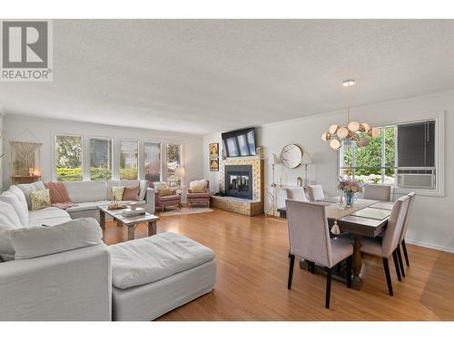 2677 Mappin Court, Kelowna, BC - Indoor Photo Showing Living Room With Fireplace