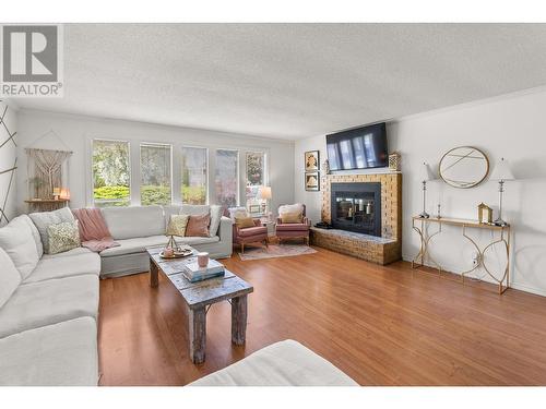 2677 Mappin Court, Kelowna, BC - Indoor Photo Showing Living Room With Fireplace