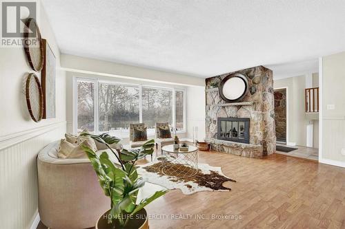 7848 Castlederg Side Road, Caledon, ON - Indoor Photo Showing Living Room With Fireplace