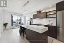 405 - 12 Bonnycastle Street, Toronto (Waterfront Communities), ON  - Indoor Photo Showing Kitchen With Upgraded Kitchen 