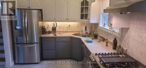 Upper - 51 Monterrey Drive, Toronto (Thistletown-Beaumonde Heights), ON - Indoor Photo Showing Kitchen With Double Sink