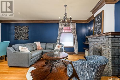 844 Algoma Avenue, Moose Jaw, SK - Indoor Photo Showing Living Room With Fireplace