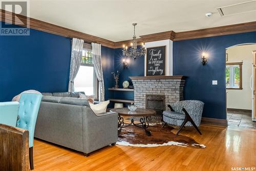 844 Algoma Avenue, Moose Jaw, SK - Indoor Photo Showing Living Room With Fireplace