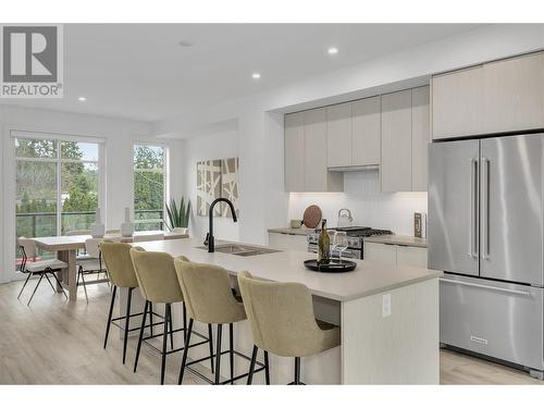 1455 Cara Glen Court Unit# 112, Kelowna, BC - Indoor Photo Showing Kitchen With Stainless Steel Kitchen With Double Sink With Upgraded Kitchen