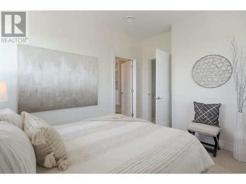 235 Taylor Road Unit# 1, Kelowna, BC - Indoor Photo Showing Bedroom