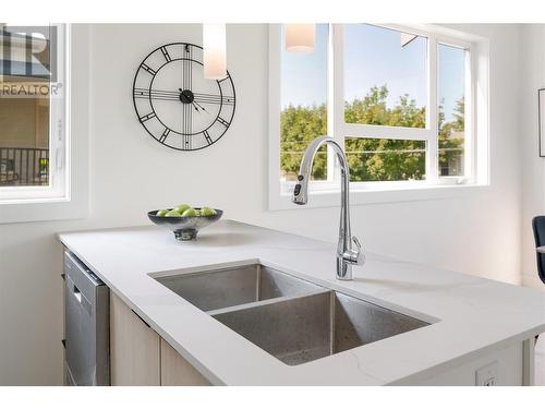 235 Taylor Road Unit# 1, Kelowna, BC - Indoor Photo Showing Kitchen With Double Sink