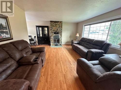 1905 93 Avenue, Dawson Creek, BC - Indoor Photo Showing Living Room With Fireplace