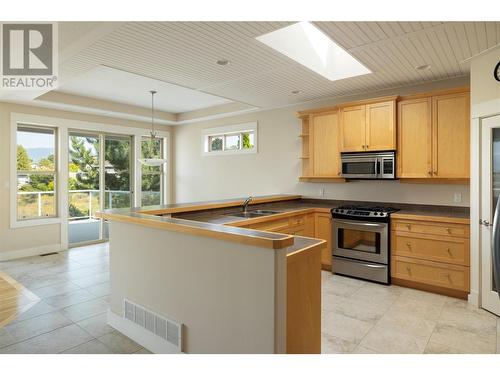 7760 Okanagan Landing Road Unit# 20, Vernon, BC - Indoor Photo Showing Kitchen With Stainless Steel Kitchen With Double Sink