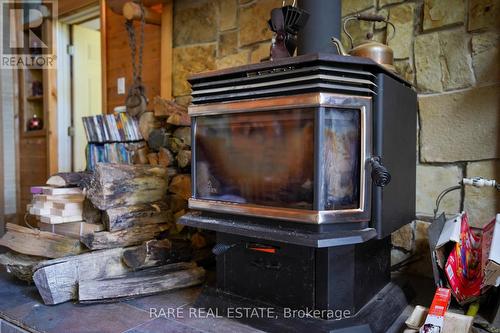 139D Petit Lane, Kearney, ON - Indoor With Fireplace