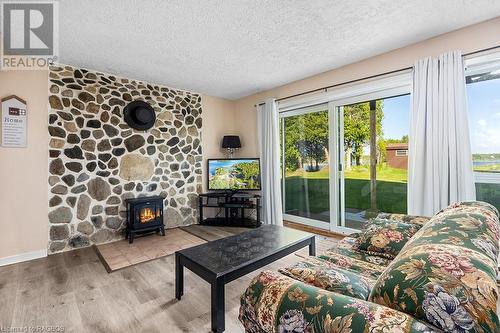 373 Eagle Road, Tobermory, ON - Indoor Photo Showing Living Room With Fireplace