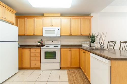 125 Wilson Street W|Unit #216, Ancaster, ON - Indoor Photo Showing Kitchen With Double Sink