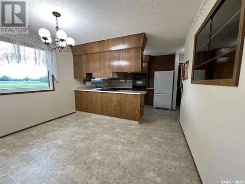 10209 6Th Avenue, Humboldt, SK - Indoor Photo Showing Kitchen With Double Sink