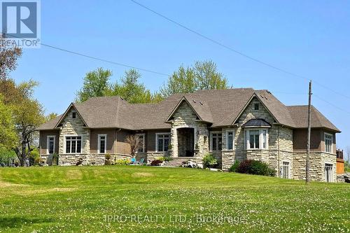 705 Lake Ridge Road S, Whitby, ON - Outdoor With Facade