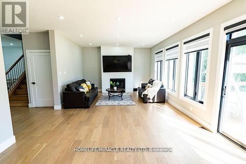 20 Poole Crescent, Middlesex Centre (Komoka), ON - Indoor Photo Showing Other Room With Fireplace