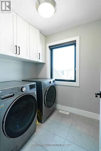 20 Poole Crescent, Middlesex Centre (Komoka), ON - Indoor Photo Showing Laundry Room