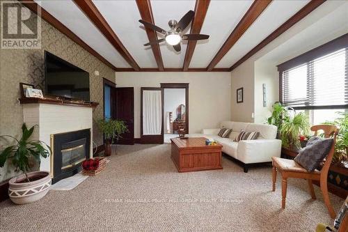 15 Frances Street N, Barrie (Queen'S Park), ON - Indoor Photo Showing Living Room With Fireplace