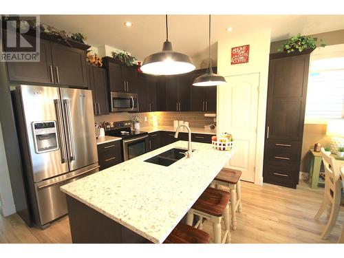 1040 Mt Revelstoke Place Unit# 33, Vernon, BC - Indoor Photo Showing Kitchen With Double Sink With Upgraded Kitchen