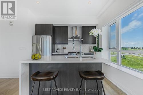 1115 - 58 Lakeside Terrace, Barrie (Little Lake), ON - Indoor Photo Showing Kitchen