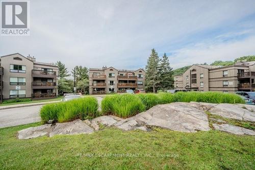 54-304 - 1235 Deerhurst Drive, Huntsville, ON - Outdoor With Balcony