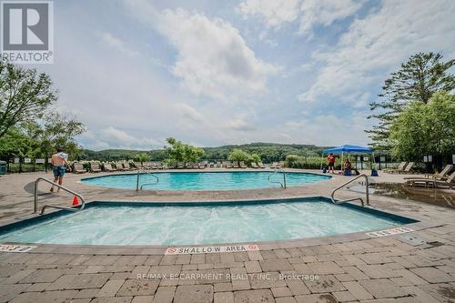 54-304 - 1235 Deerhurst Drive, Huntsville, ON - Outdoor With In Ground Pool