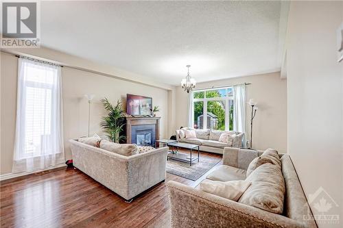 536 Golden Sedge Way, Ottawa, ON - Indoor Photo Showing Living Room With Fireplace