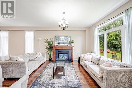 536 Golden Sedge Way, Ottawa, ON - Indoor Photo Showing Living Room With Fireplace