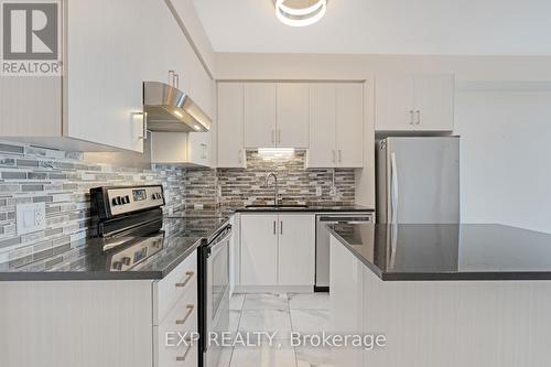 510 - 2486 Old Bronte Road, Oakville (Palermo West), ON - Indoor Photo Showing Kitchen With Stainless Steel Kitchen With Upgraded Kitchen