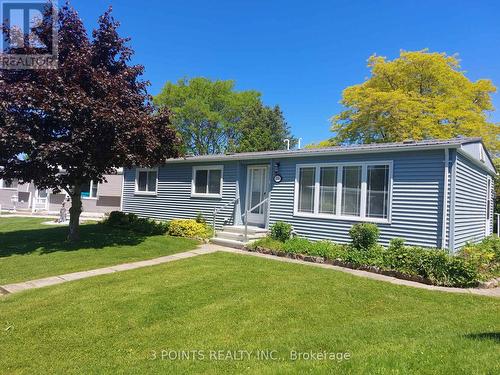 195 Pebble Beach Parkway, South Huron (Stephen Twp), ON - Outdoor With Facade