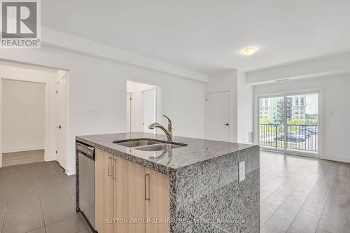 111 - 4 Spice Way, Barrie, ON - Indoor Photo Showing Kitchen With Double Sink