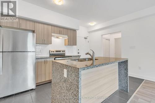 111 - 4 Spice Way, Barrie, ON - Indoor Photo Showing Kitchen With Double Sink With Upgraded Kitchen