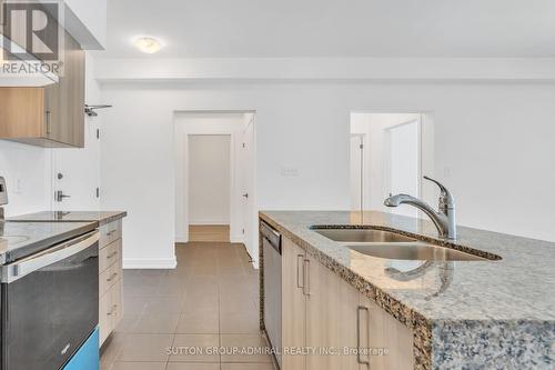 111 - 4 Spice Way, Barrie, ON - Indoor Photo Showing Kitchen With Double Sink