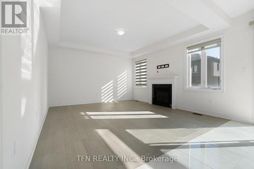 134 Granite Ridge Trail, Hamilton (Waterdown), ON - Indoor Photo Showing Other Room With Fireplace