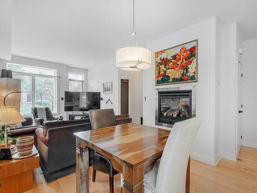 Dining room - 2460 Rue Des Francs-Bourgeois, Boisbriand, QC - Indoor Photo Showing Dining Room With Fireplace