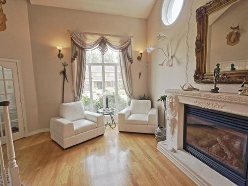 Autre - 74 Rue Antoine-Forestier, Carignan, QC - Indoor Photo Showing Living Room With Fireplace