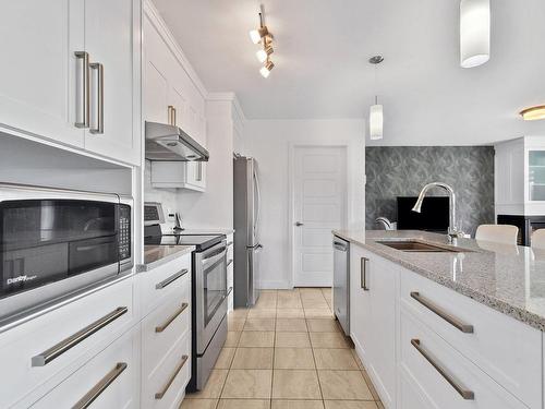 Cuisine - 302-507 Rue Castonguay, Saint-Jérôme, QC - Indoor Photo Showing Kitchen With Upgraded Kitchen