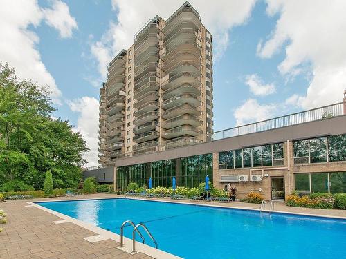 Pool - 1503-4300 Place Des Cageux, Laval (Chomedey), QC - Outdoor With In Ground Pool