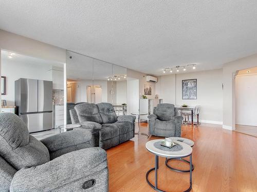 Living room - 1503-4300 Place Des Cageux, Laval (Chomedey), QC - Indoor Photo Showing Living Room