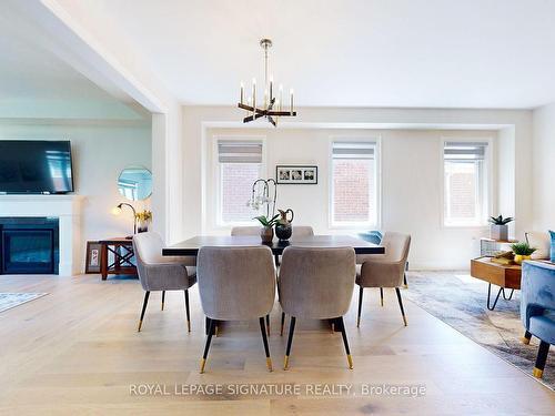 422 Humphrey St, Hamilton, ON - Indoor Photo Showing Dining Room With Fireplace