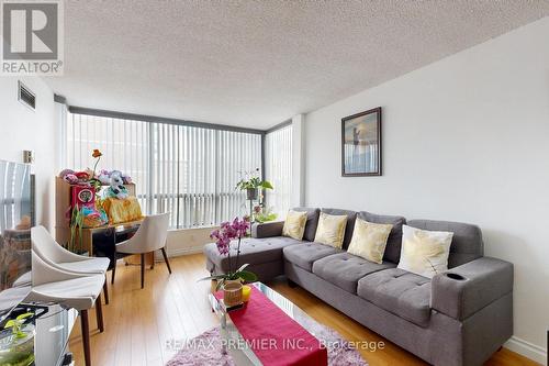 1218 - 3050 Ellesmere Road N, Toronto, ON - Indoor Photo Showing Living Room