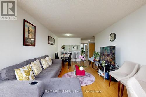 1218 - 3050 Ellesmere Road N, Toronto, ON - Indoor Photo Showing Living Room